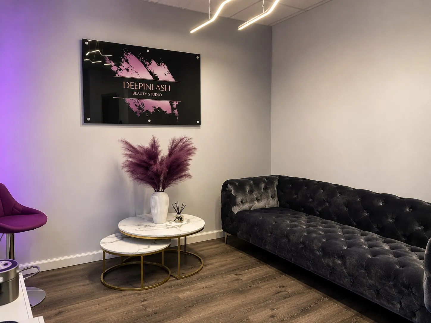 Reception and waiting lounge inside the DEEPINLASH lash studio, Brooklyn