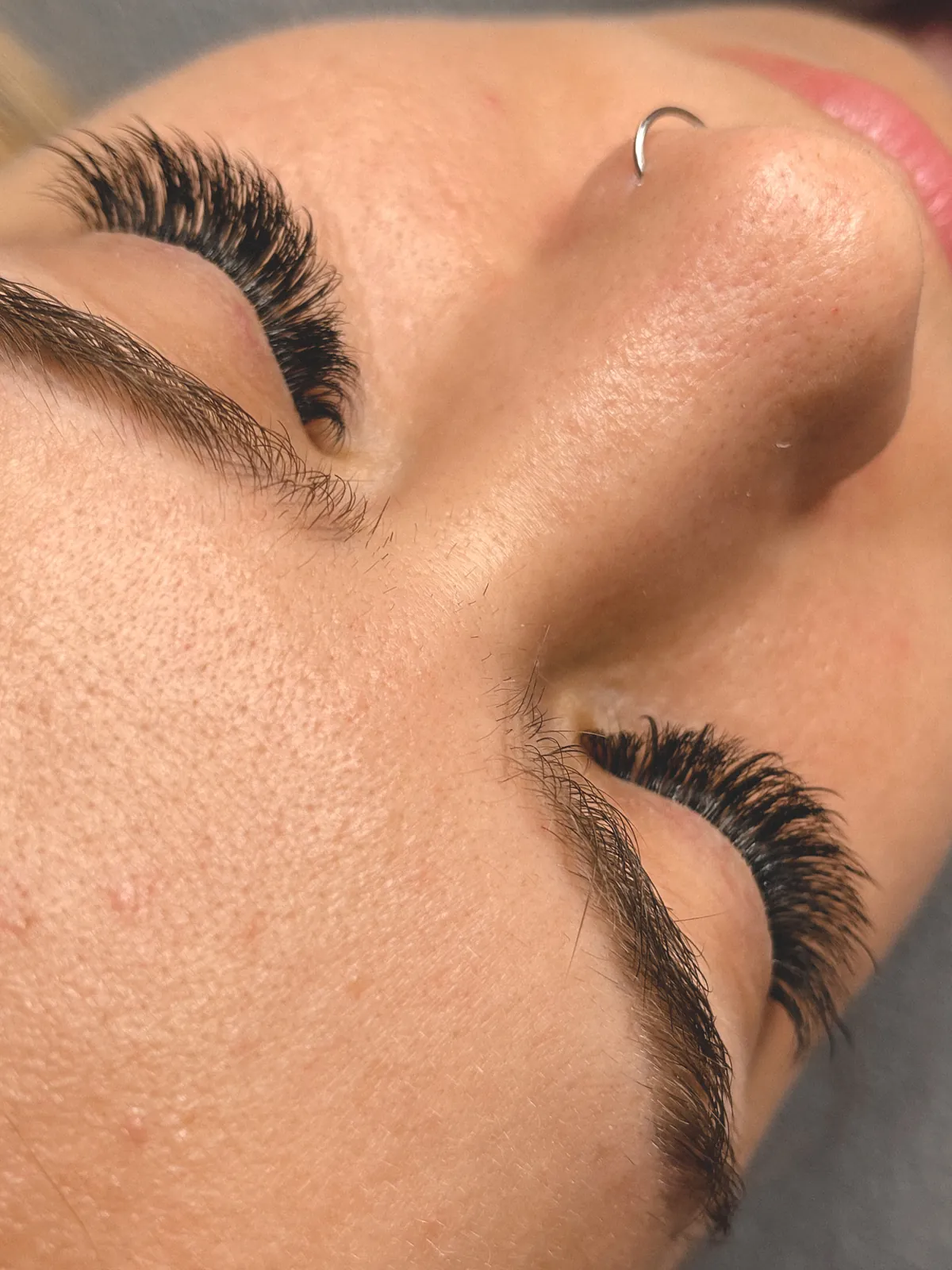 Wispy volume lash set viewed with the eye closed, Gravesend Brooklyn